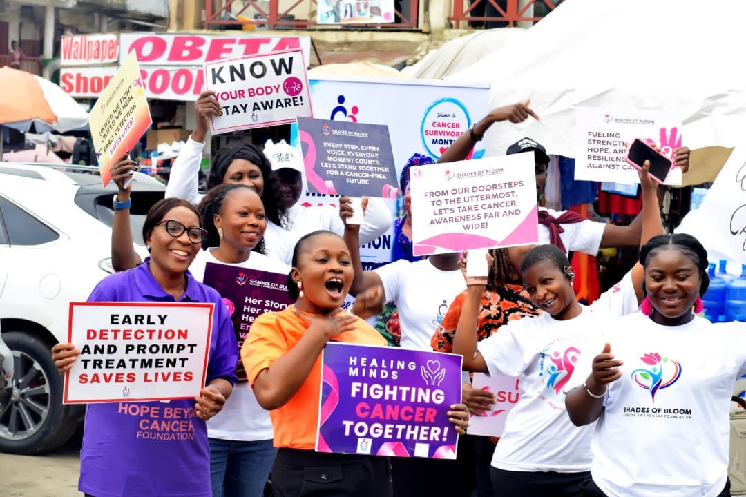 Traders at a market during a Shades of Bloom awareness outreach